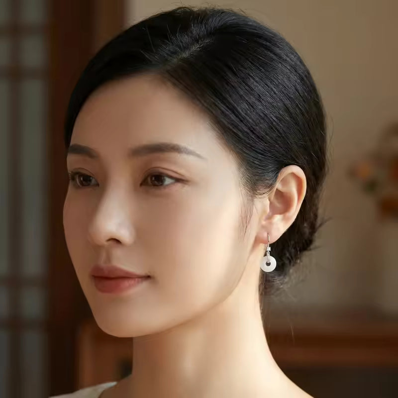Elegant White Stone Drop Earrings with Polished Silver Accents