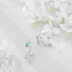Sterling Silver Snake Stud Earrings with Green Eyes – Cubic Zirconia
