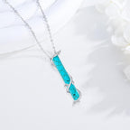 Turquoise Pendant With Vine Design
