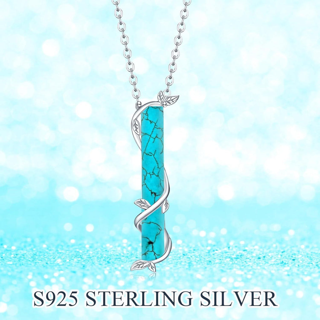 Turquoise Pendant With Vine Design