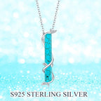 Turquoise Pendant With Vine Design
