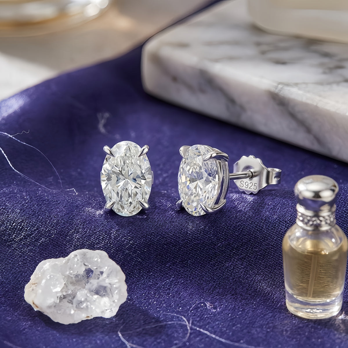 Sterling Silver Oval-Cut Cubic Zirconia Stud Earrings