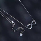 Sterling Silver Moissanite Mobius Ring Necklace