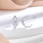 Sterling Silver Infinity Crossover Huggie Hoops