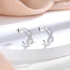 Sterling Silver Infinity Crossover Huggie Hoops