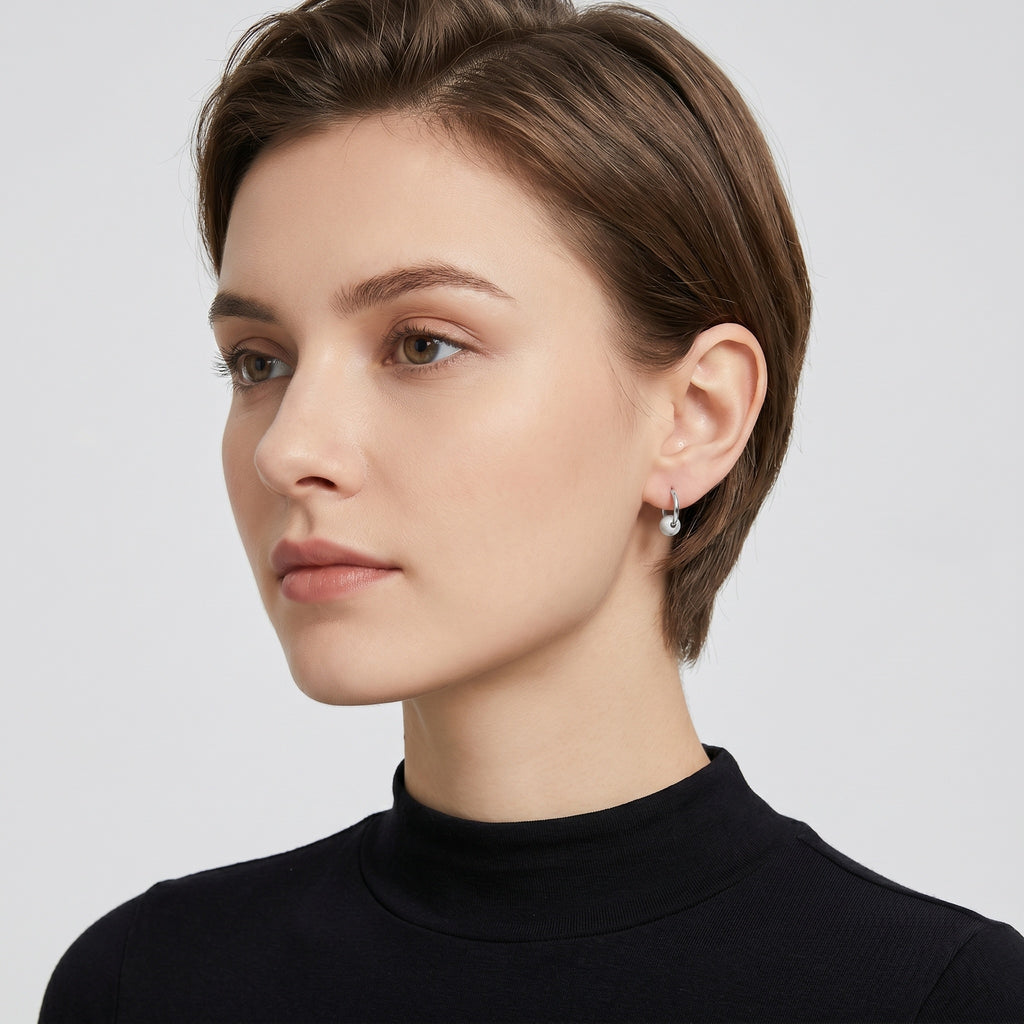 Elegant Gilded Huggie Hoop Earrings with Textured Sphere Charm