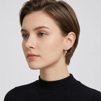 Elegant Gilded Huggie Hoop Earrings with Textured Sphere Charm