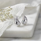 Elegant Silver Teardrop Stud Earrings with CZ Accents
